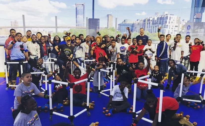 large group of kids and teenagers posing for photo