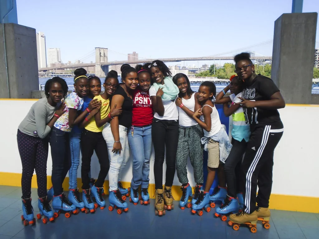 Group of Teenagers with City Skyline