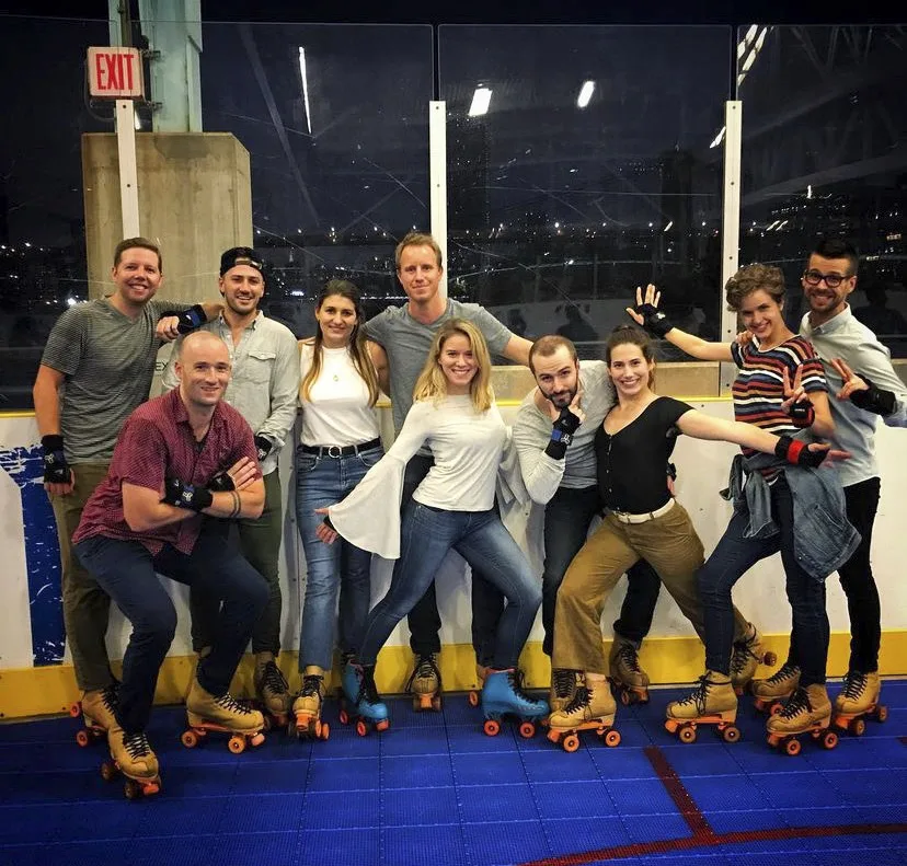 Group of men and woman making funny poses