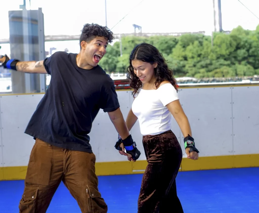 young couple having fun while skating
